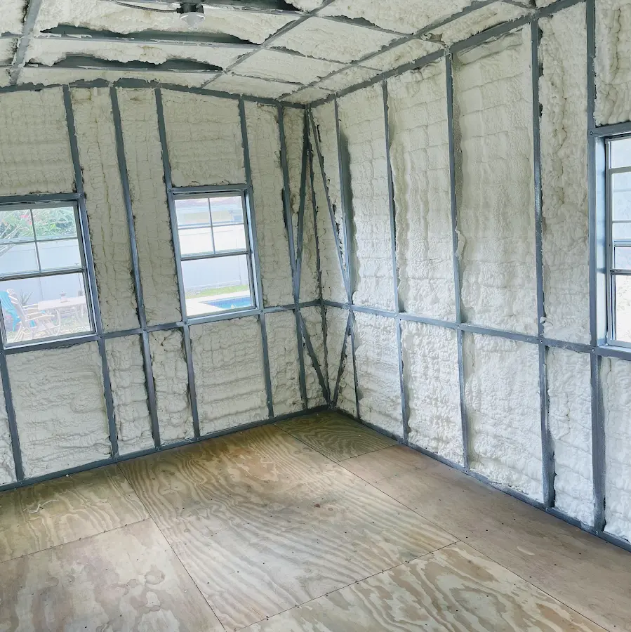 Closed-cell spray foam insulation applied to wall cavities in a residential project in Bealeton